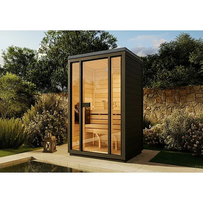 FinnTherm Saunahaus Kuuma S black - Elektroofen, L x B x H: 111 x 138 x 213 cm - Einladende Gartensauna mit dunklem Rahmen und viel Glas, die einen Blick auf die helle Holzinnenausstattung und die Bänke freigibt.