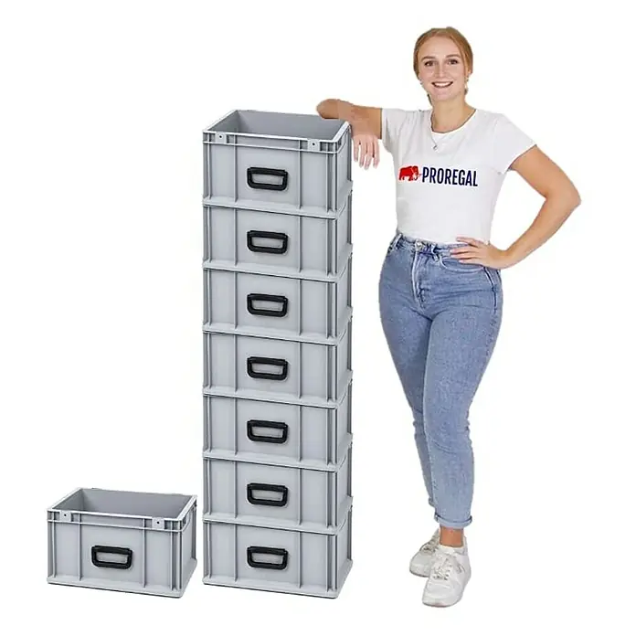 Proregal Euroboxen-Set 8x Eurobox NextGen Portable Uno - L x B x H: 40 x 30 x 22 cm, Kunststoff, Grau, 8 Stk. - Stapelbare graue Lagerbehälter mit schwarzen Griffen und einer Frau, die daneben steht.