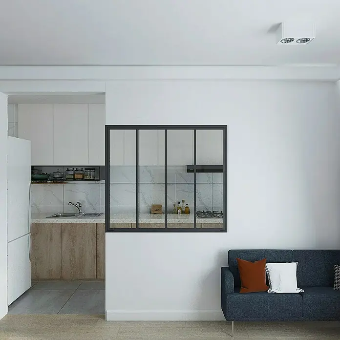 Inova Aluminiumfenster Loft Innenfenster Glas - 123 x 108 cm - Ein Wohnzimmer mit einem blauen Sofa und einem Fenster zur Küche. Helle und moderne Inneneinrichtung mit Fokus auf Komfort und Stil.