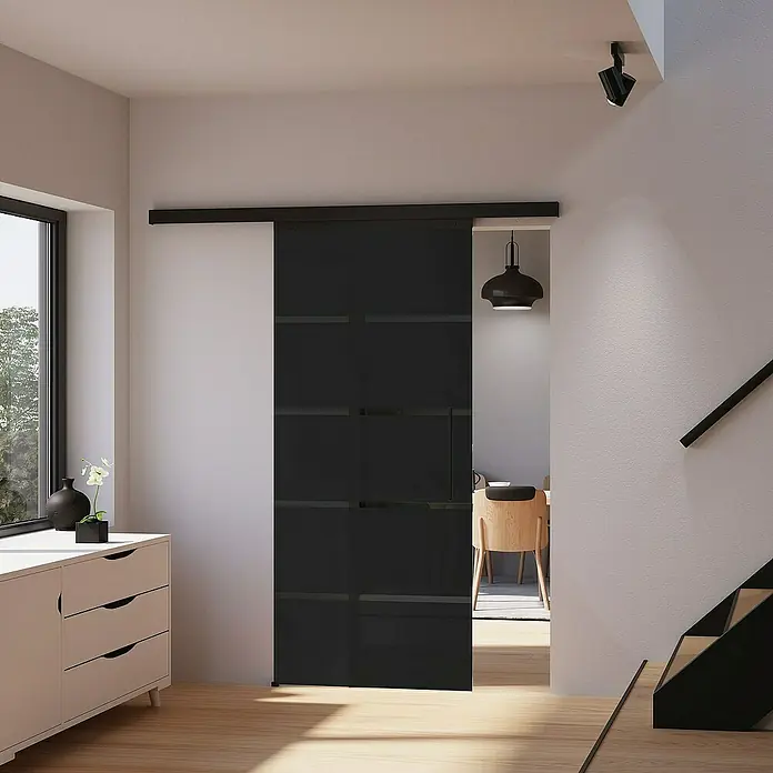 Inova Schiebetür-Komplettset Glas Komplettset Blockstreifen Grauglas schwarz mit Stabgriff - 900 x 2.035 mm - Elegantes Bild einer schwarzen Schiebetür mit modernem Design, ideal für stilvolle Innenräume, die Funktionalität und Ästhetik vereinen.
