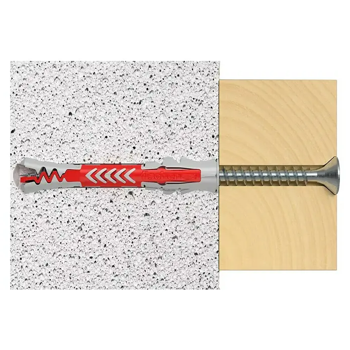 Fischer Taco universal DuoPower - Ø x L: 8 x 65 mm, Plástico, 4 ud. - Primer plano de una fijación de anclaje universal Fischer UX en una pared con un tornillo que atraviesa un trozo de madera.