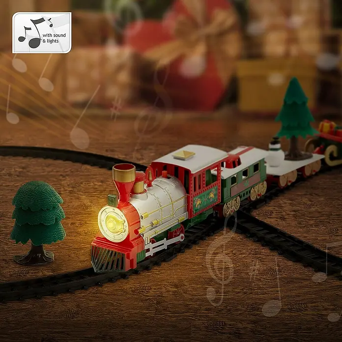 ECD Germany LED-Weihnachtsdekofigur Weihnachtszug Set 22 Teile Weihnachtsbahn Spielzeugzug Kinder Deko Zug - 44 x 91 x 10 cm, Weiß, Rot, Grün, Akkubetrieben, LED - Ein weihnachtlicher Spielzeugzug mit Lichtern und Geräuschen fährt auf einer schwarzen Gleisstrecke um einen kleinen grünen Baum herum.