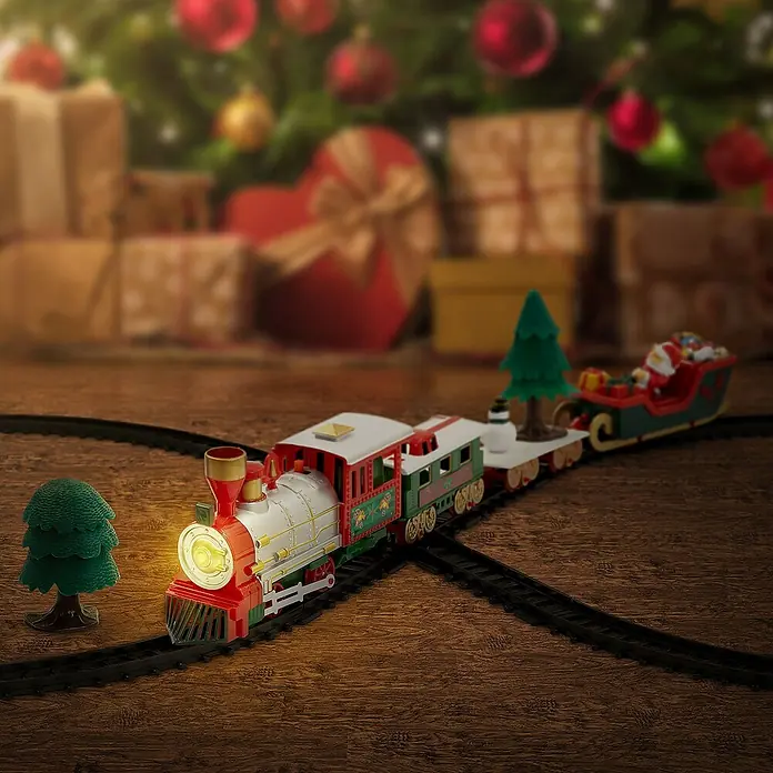 ECD Germany LED-Weihnachtsdekofigur Weihnachtszug Set 22 Teile Weihnachtsbahn Spielzeugzug Kinder Deko Zug - 44 x 91 x 10 cm, Weiß, Rot, Grün, Akkubetrieben, LED - Ein festlicher Spielzeugzug mit leuchtendem Scheinwerfer fährt auf einer Strecke vor einem Weihnachtsbaum mit Geschenken.