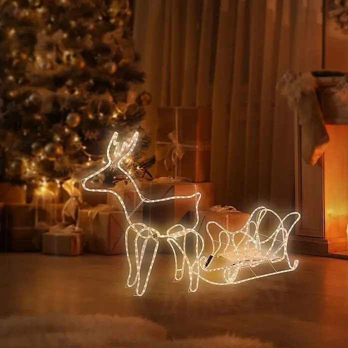 ECD Germany LED-Weihnachtsdekofigur Lichterschlauch LED Beleuchtung Gartenleuchte Weihnachtshirsch Rentier - 273 x 28 x 77 cm, Transparent, Netzbetrieben, LED - Leuchtendes Rentier mit Schlitten vor Weihnachtsbaum. Festliche Weihnachtsdekoration für eine stimmungsvolle Atmosphäre.