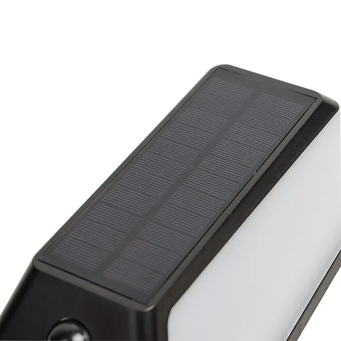Arte confort Aplique solar para exterior Lexor - 1,4 W, Blanco cálido, Blanco - Primer plano de una lámpara solar negra con panel solar en la parte superior, ideal para uso exterior.
