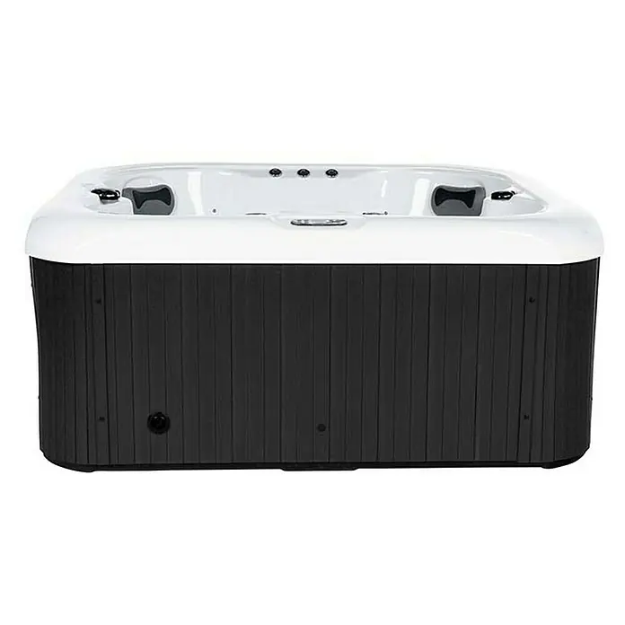 Home Deluxe Outdoor Whirlpool SEA STAR Pure -  - Ein rechteckiger Whirlpool mit einer weißen Oberseite und einer dunklen, holzartigen Verkleidung. Ideal für Entspannung.