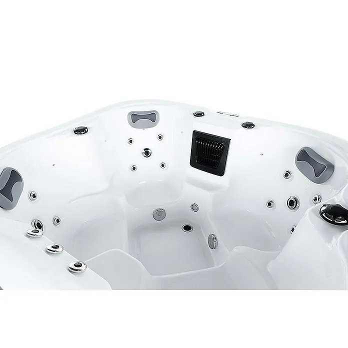 Home Deluxe Outdoor Whirlpool SEA STAR Pure -  - Nahaufnahme eines leeren Whirlpools mit verschiedenen Düsen, Bedienelementen und Kopfstützen.