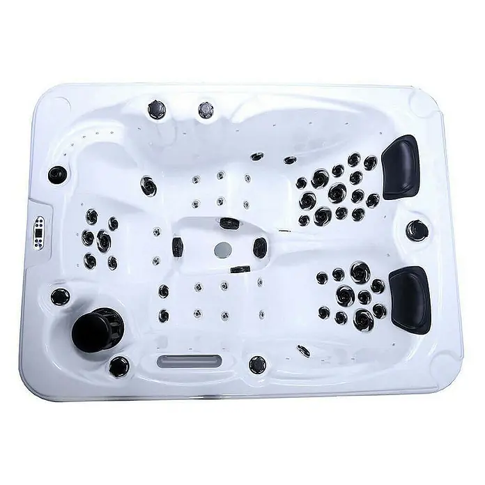 HOME DELUXE Outdoor Whirlpool BEACH Pure -  - Ein luxuriöser, weißer Whirlpool mit zahlreichen Düsen und bequemen Kopfstützen für ultimative Entspannung.
