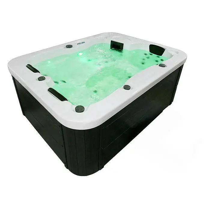 HOME DELUXE - Outdoor Whirlpool WHITE MARBLE PURE - 210 x 160 cm für 3 Personen | Ausstattung: Pure -  - Blick auf einen Whirlpool mit schwarzem Gehäuse und sprudelndem grünem Wasser, ideal für Entspannung und Therapie.
