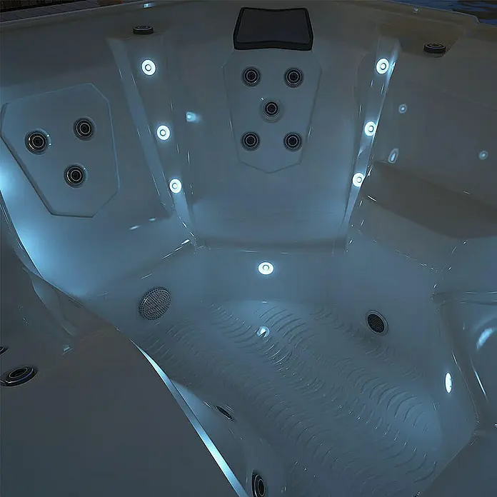Home Deluxe Außen-Whirlpool STREAM BIG PURE - Anthrazit, Max. Personenzahl: 5 Stk. - Innenansicht eines Whirlpools mit Jets und eingebauten Leuchten.