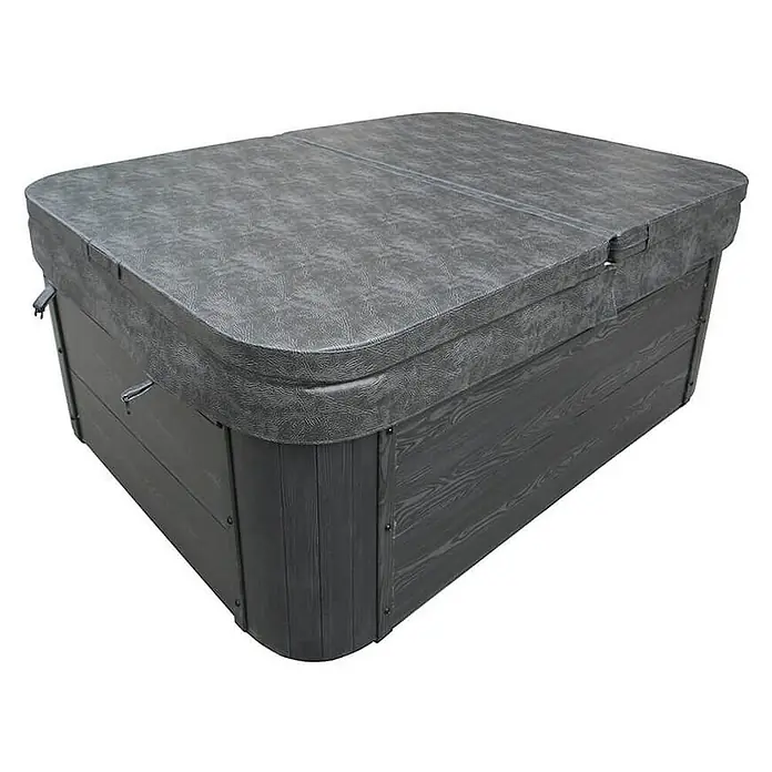 Home Deluxe Outdoor Whirlpool WHITE MARBLE Mit Treppe und Thermoabdeckung -  - Nahaufnahme eines Whirlpools mit grauem Bezug, der Schutz und Wärme bietet. Die Oberfläche ist strukturiert und wasserabweisend.