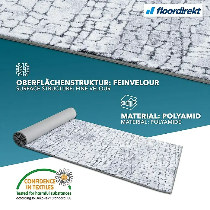 Teppichläufer Aqua - Grau, 350 x 80 cm, 100 % Polyamid - Detailaufnahme eines grauen Teppichs mit feiner Velours-Oberfläche, hergestellt aus Polyamid und geprüft auf Schadstoffe.