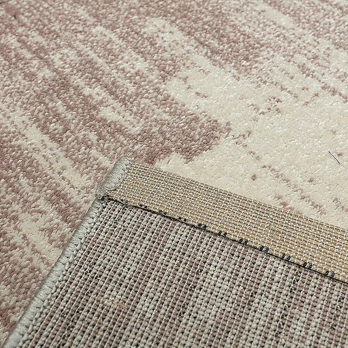 Dekoria Flachgewebeteppich - pink, beige, 230 x 160 cm - Nahaufnahme eines beigefarbenen Teppichs mit zartem Muster und sichtbarer Rückseite, der die Textur des Gewebes zeigt.