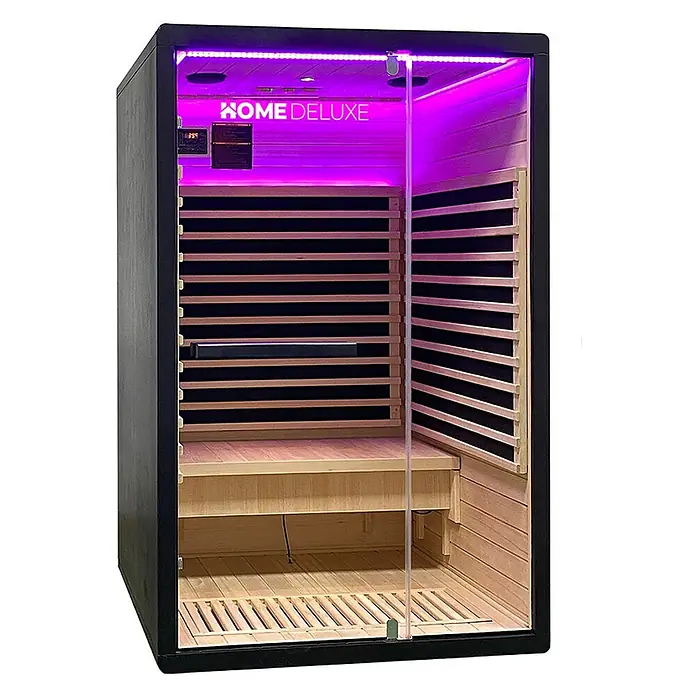 Home Deluxe Elementsauna NERO M - Sonstige, Steuerung Ofen: Integriert - Home Deluxe Infrarotsauna mit schwarzem Äußeren, hellem Holzinterieur, Glastür und violetter LED-Beleuchtung.