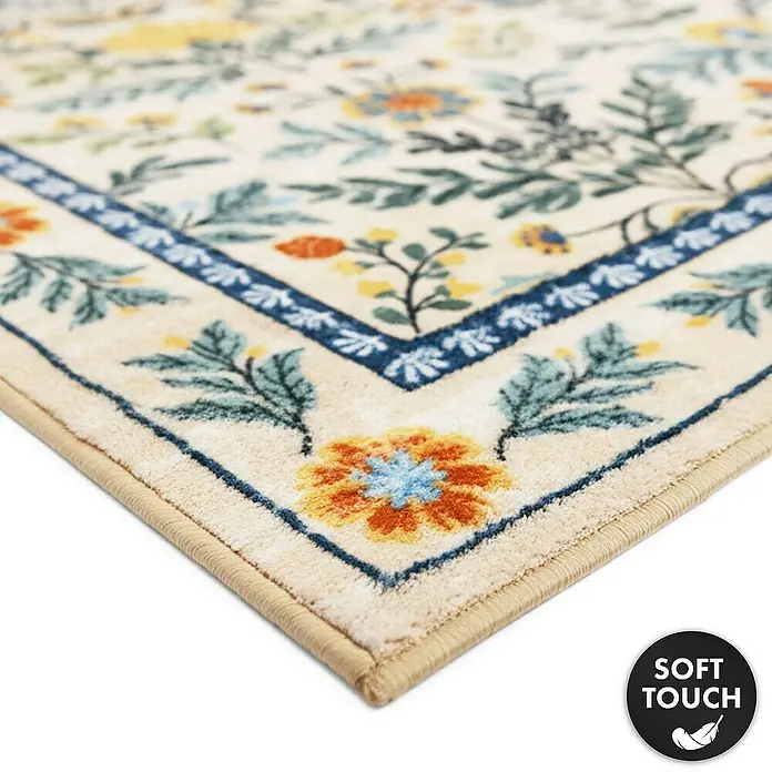 Floordirekt Kurzflorteppich Orientalis 160 x 230 cm - Ecru, 230 x 160 cm - Weicher, cremefarbener Teppich mit floralem Muster in Blau, Orange, Gelb und Grün und einer dekorativen blauen Bordüre.