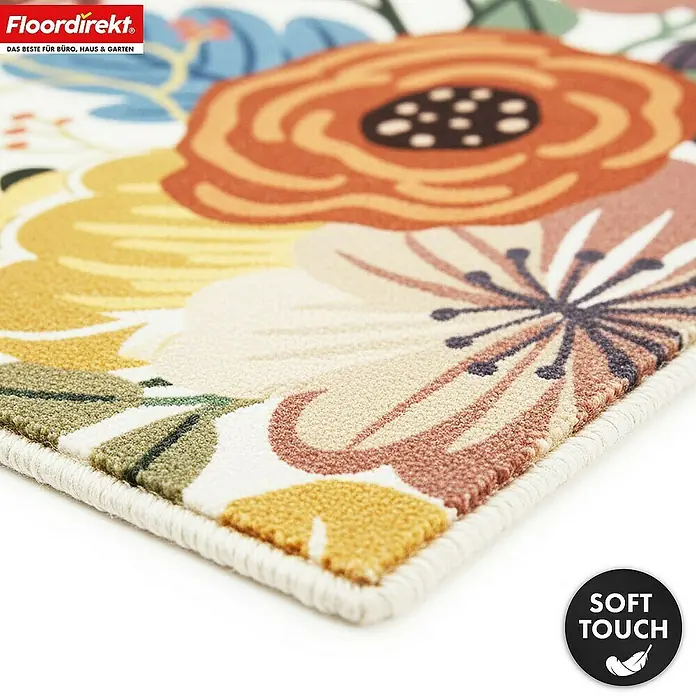 Floordirekt Kurzflorteppich Fleur 200 x 290 cm - Multicolor - Nahaufnahme eines Soft-Touch-Teppichs mit lebhaftem Blumenmuster in Orange-, Gelb- und Beigetönen.