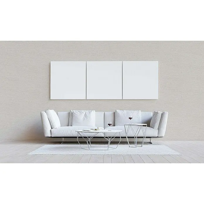 Tadessi Vliestapete M1-No.1783 - Weiß, Sonstiges, 10,05 x 0,53 m - Drei leere weiße Leinwände über einem minimalistischen weißen Sofa in einem hellen Wohnzimmer.