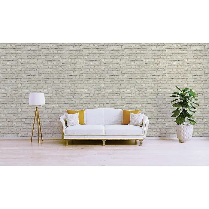 Tadessi Vliestapete M1-No.396 - Grau, Steinoptik, 10,05 x 0,53 m - Weiße Ziegelsteinwand-Textur in einem modernen Wohnzimmer, dient als heller und stilvoller Hintergrund.