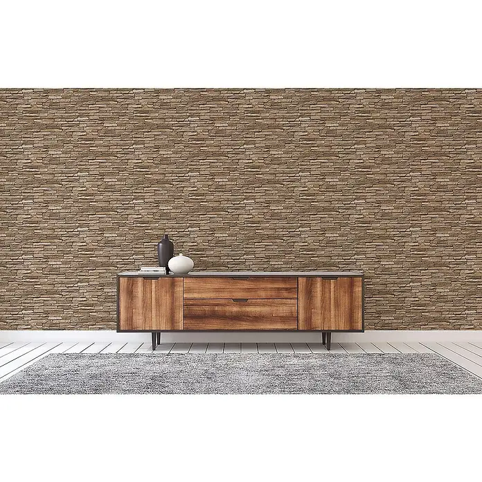 Tadessi Vliestapete M1-No.3817 - Braun, Steinoptik, 10,05 x 0,53 m - Hölzernes Sideboard mit grauer Platte und zwei Schubladen, als Dekorationsstück in einem Raum mit strukturierter Wand.