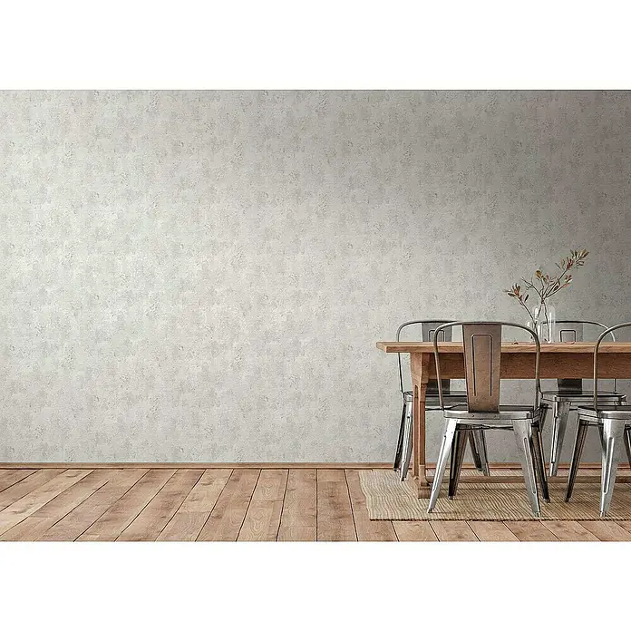 Tadessi Vliestapete M1-No.4037 - Grau, Steinoptik, 10,05 x 0,53 m - Hellgraue, strukturierte Tapete mit Betonoptik an einer Wand in einem Esszimmer.