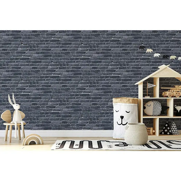 Tadessi Vliestapete M1-No.745 - Schwarz, Steinoptik, 10,05 x 0,53 m - Dunkelgraue Ziegelsteintapete an einer Wand in einem Kinderzimmer.