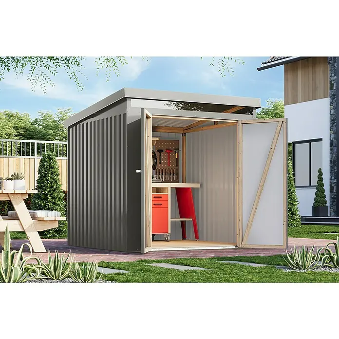 Karibu Gerätehaus Marder 2 - Außenmaß inkl. Dachüberstand (B x T): 215 x 215 cm, Stahl, Graualuminium - Eine moderne, graue Gartengerätehaus mit geöffneter Tür, die einen Einblick in eine Werkbank und Werkzeuge bietet.
