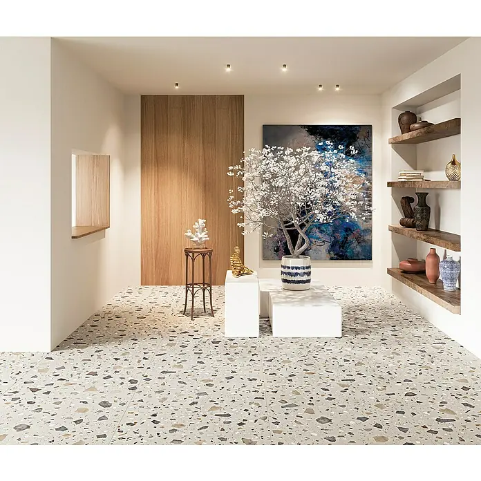 Feinsteinzeugfliese Pebble - 59,55 x 59,55 cm, Ivory, Matt - Einrichtungsidee mit Terrazzoboden, der dem Raum ein elegantes Aussehen verleiht. Der Boden ist robust und pflegeleicht.
