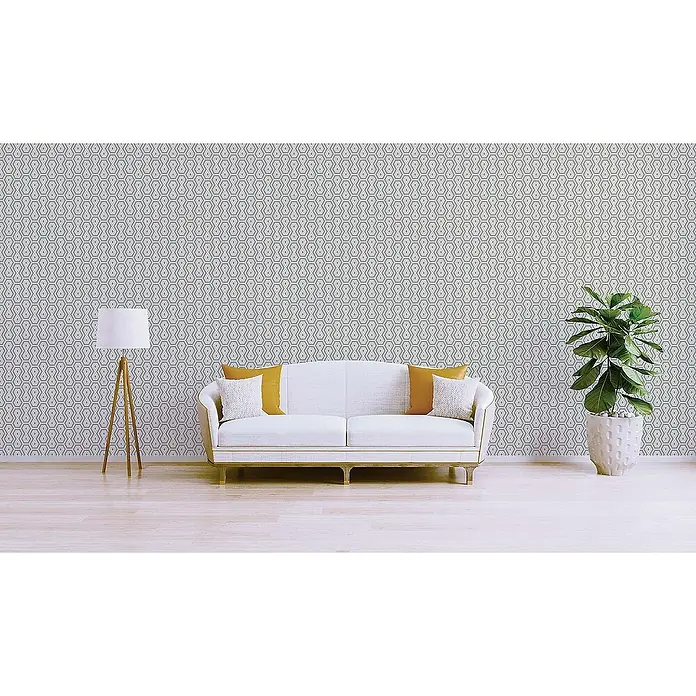 Tadessi Vliestapete M1-No.1542 - Grau, Sonstiges, 10,05 x 0,53 m - Geometrische Tapete in Hellgrau und Weiß an einer Wohnzimmerwand hinter einem Sofa.