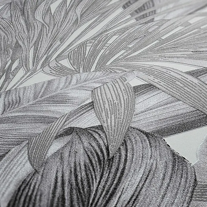 Tadessi Vliestapete M1-No.251 - Schwarz, Floral, 10,05 x 0,53 m - Strukturierte Tapete mit monochromatischem tropischem Blattmuster in Grautönen, das eine detailreiche Oberfläche zeigt.