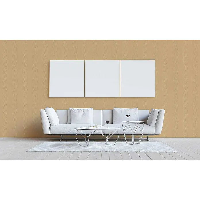 Tadessi Vliestapete M1-No.3803 - Gelb, Streifen, 10,05 x 0,53 m - Drei leere weiße Leinwände horizontal über einem weißen Sofa in einem modernen Wohnzimmer arrangiert.