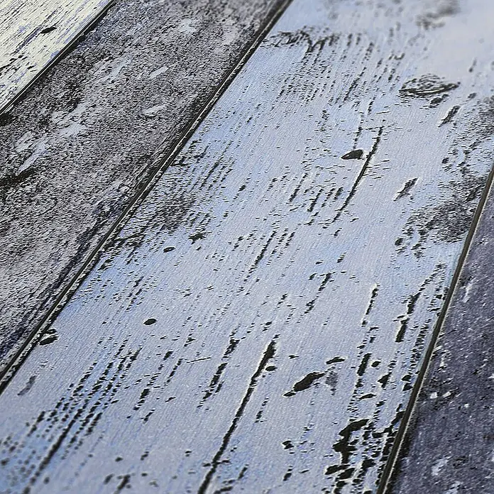 Tadessi Vliestapete M1-No.862 - Blau, Holzoptik, 10,05 x 0,53 m - Verwitterte Holzbretter in Blau und Grau, mit abgenutzter Farbe und sichtbarer Textur, ideal für rustikale Böden oder Verkleidungen.
