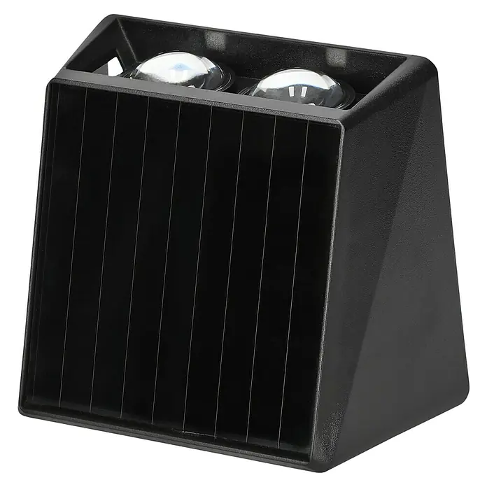BAUHAUS Solar-Außenwandleuchte - L x B x H: 6,4 x 10,7 x 9,7 cm, Schwarz, IP65, 40 lm - Nahaufnahme einer schwarzen Solarleuchte mit zwei runden Linsen. Die Lampe hat ein modernes Design und ist perfekt für den Außenbereich.