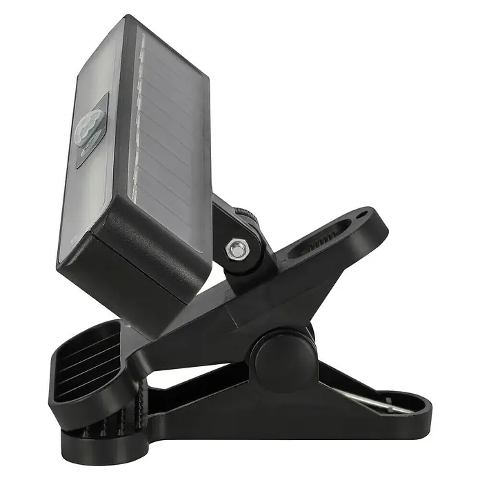 BAUHAUS LED-Klemmleuchte Solar - L x B x H: 19,8 x 2,5 x 3,2 cm, Lichtfarbe: Kaltweiß - Detailaufnahme einer schwarzen Klemmleuchte mit integriertem Solarmodul und Bewegungssensor, ideal für flexible Beleuchtungslösungen.