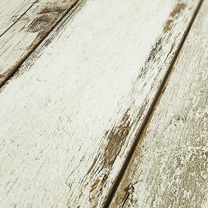 Tadessi Vliestapete M1-No.252 - Creme, Holzoptik, 10,05 x 0,53 m - Verwitterte weiße Holzplanken mit abgeplatzter Farbe, die eine rustikale Textur zeigen.