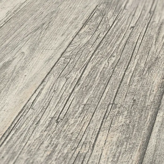Tadessi Vliestapete M1-No.916 - Grau, Holzoptik, 10,05 x 0,53 m - Nahaufnahme von hellgrauem, verwittertem Holzfußboden mit ausgeprägter Maserung und Textur.