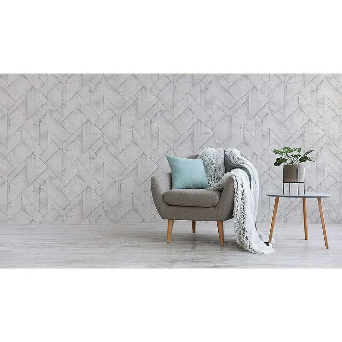 Tadessi Vliestapete M1-No.544 - Grau, Steinoptik, 10,05 x 0,53 m - Hellgraue geometrische Tapete mit Betonstruktur an einer Wand in einem modernen Interieur.