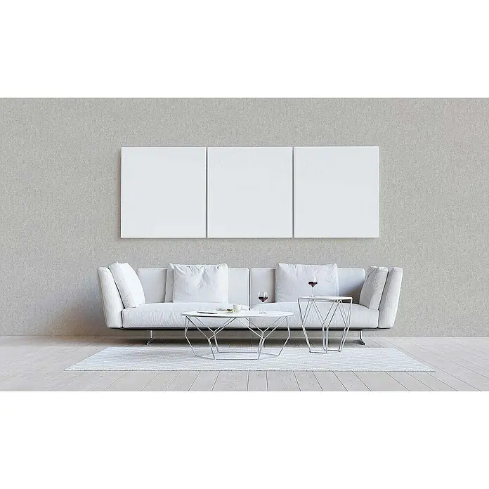 Tadessi Vliestapete M1-No.1814 - Grau, Steinoptik, 10,05 x 0,53 m - Drei weiße leere Leinwände über einem Sofa in einem modernen Wohnzimmer.