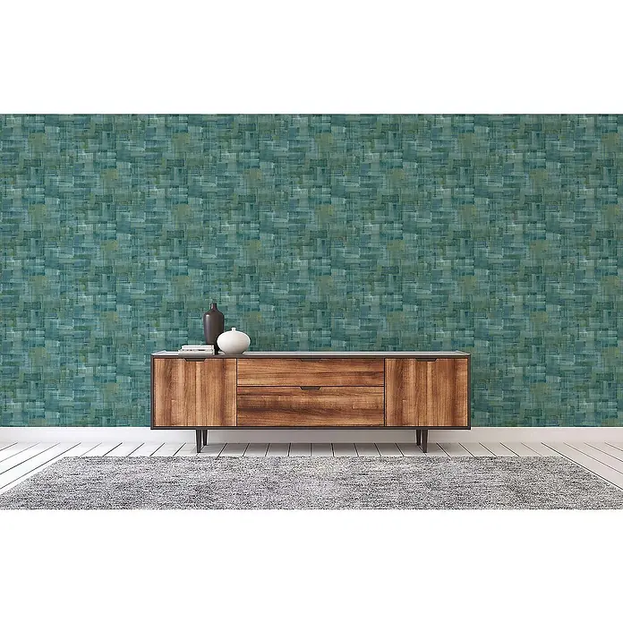 Tadessi Vliestapete M1-No.1470 - Blau, Sonstiges, 10,05 x 0,53 m - Türkis-grüne Mosaik-Tapete an einer Wand, die eine lebendige Kulisse für ein Sideboard bildet.