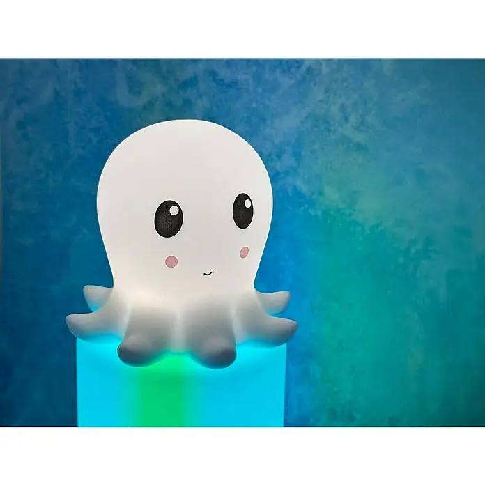 FHL easy LED-Nachtlicht Nelly - 0,4 W, L x B x H: 13,5 x 13,5 x 12 cm, RGBW, Tintenfisch Nelly - Nahaufnahme einer niedlichen, weißen Oktopus-Nachtlampe mit rosa Wangen und einem sanften Leuchten, perfekt für Kinderzimmer.