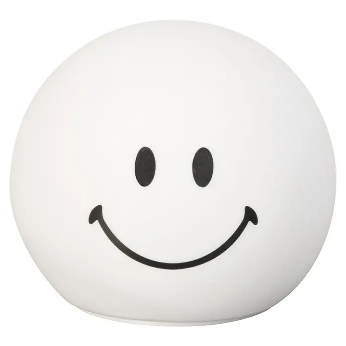 FHL easy LED-Nachtlicht GlowMoji - 0,7 W, L x B x H: 13 x 13 x 12 cm, RGBW, Glowmoji White - Nahaufnahme einer runden, weißen Lampe mit einem aufgedruckten schwarzen Smiley-Gesicht, das eine positive und freundliche Atmosphäre schafft.