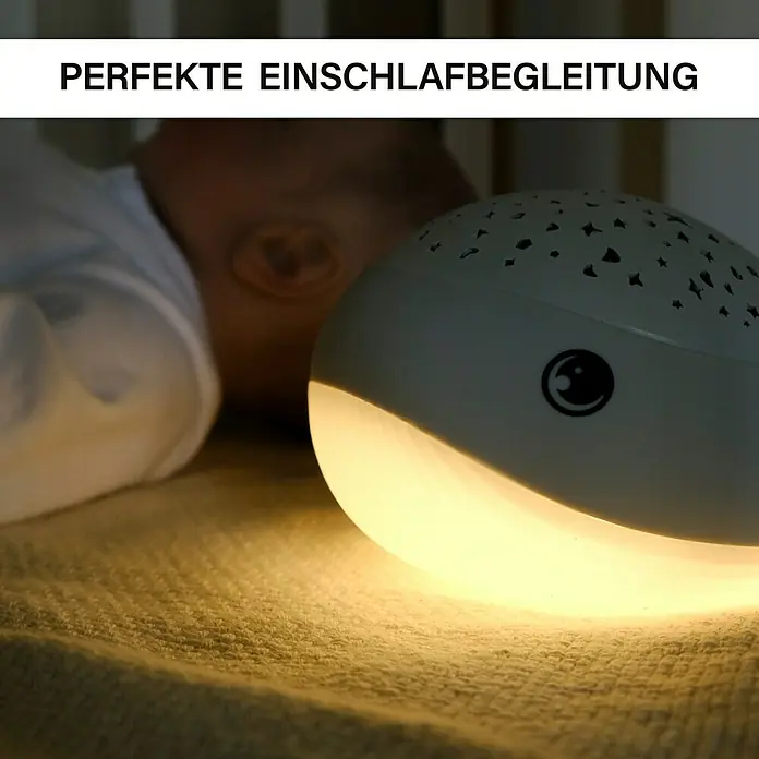 LED-Nachtlicht Wal Willy - L x B x H: 17 x 8,9 x 14 cm, RGBW - Walförmige Nachtlampe für Babys, die ein warmes Licht spendet und Sternmuster projiziert, um eine beruhigende Schlafumgebung zu schaffen.