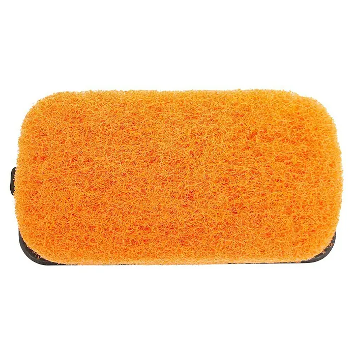 Cozze Grillbürste für Grillplatten - L x B: 14,3 x 7,3 cm - Nahaufnahme eines orangefarbenen Schwamms mit rauer Textur, ideal für Reinigungsarbeiten.