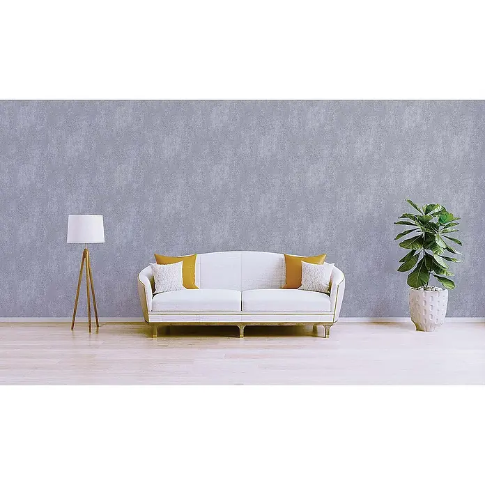 Tadessi Vliestapete M1-No.584 - Grau, Steinoptik, 10,05 x 0,53 m - Weißes Polstersofa mit gelben und weißen Kissen, akzentuiert mit Goldverzierung.
