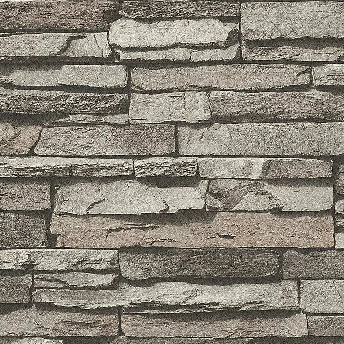 Tadessi Vliestapete M1-No.908 - Creme, Steinoptik, 10,05 x 0,53 m - Textur einer Natursteinwand mit unregelmäßigen, rechteckigen Steinen in Grau- und Brauntönen.