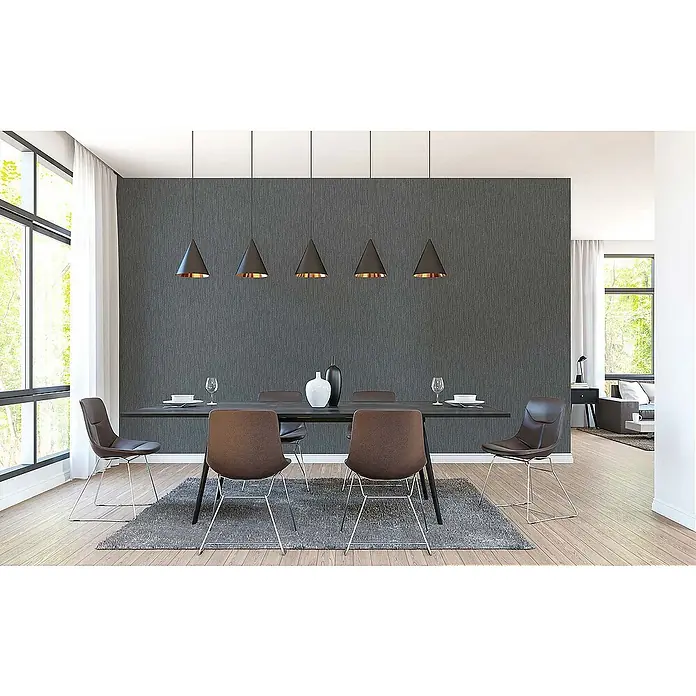 Tadessi Vliestapete M1-No.483 - Schwarz, Uni, 10,05 x 0,53 m - Dunkelgraue strukturierte Tapete in einem modernen Esszimmer.
