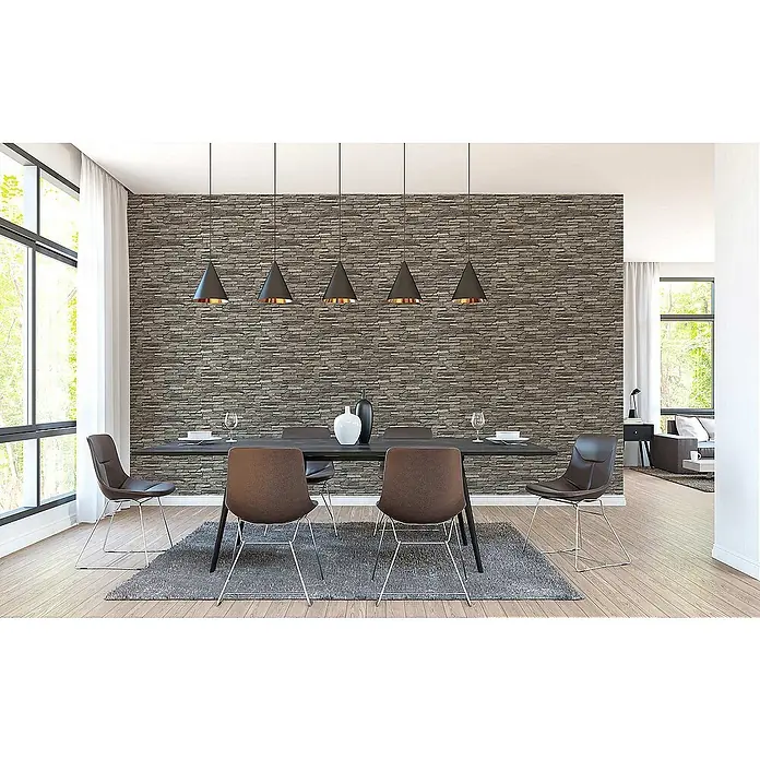 Tadessi Vliestapete M1-No.8 - Schwarz, Steinoptik, 10,05 x 0,53 m - Graue Tapete in Schichtsteinoptik in einem modernen Esszimmer als texturierte Akzentwand.