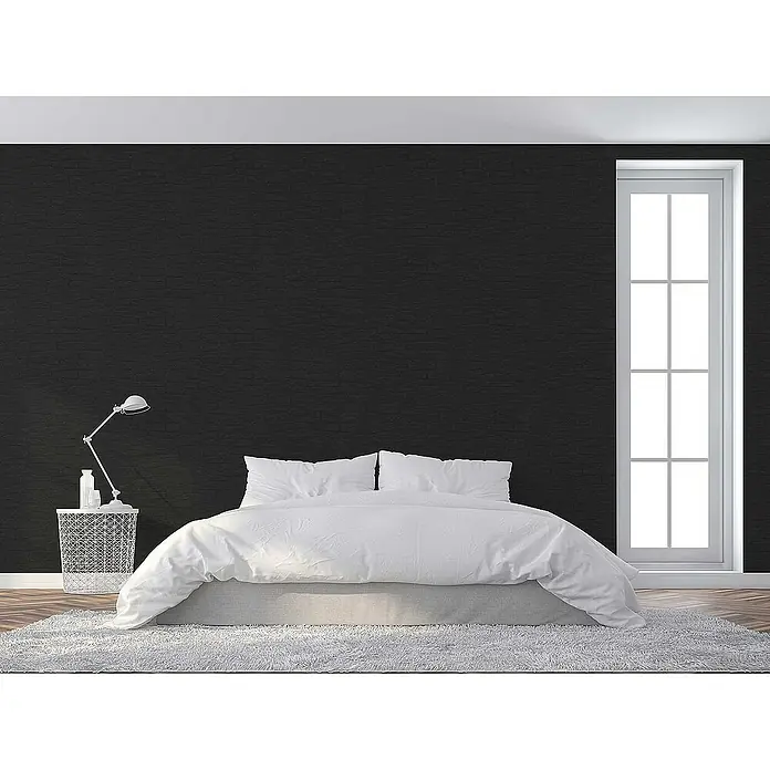 Tadessi Vliestapete M1-No.1965 - Schwarz, Steinoptik, 10,05 x 0,53 m - Weiße Bettwäsche auf einem Bett mit grauem Untergestell in einem modernen Schlafzimmer.