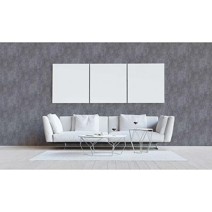 Tadessi Vliestapete M1-No.585 - Grau, Steinoptik, 10,05 x 0,53 m - Minimalistisches Wohnzimmer mit weißem Sofa, geometrischen Tischen und drei leeren weißen Wandkunst-Leinwänden.