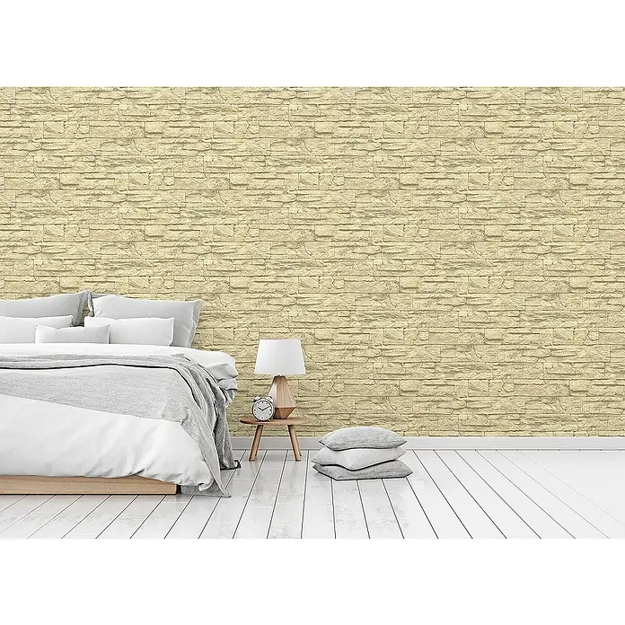 Tadessi Vliestapete M1-No.3639 - Creme, Steinoptik, 10,05 x 0,53 m - Helle, beige Tapete mit geschichteter Steinoptik an einer Schlafzimmerwand.