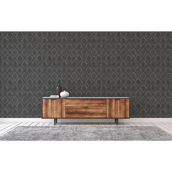Tadessi Vliestapete M1-No.2431 - Schwarz, Ornament, 10,05 x 0,53 m - Dunkelgraue Tapete mit dezentem Muster an einer Wand.